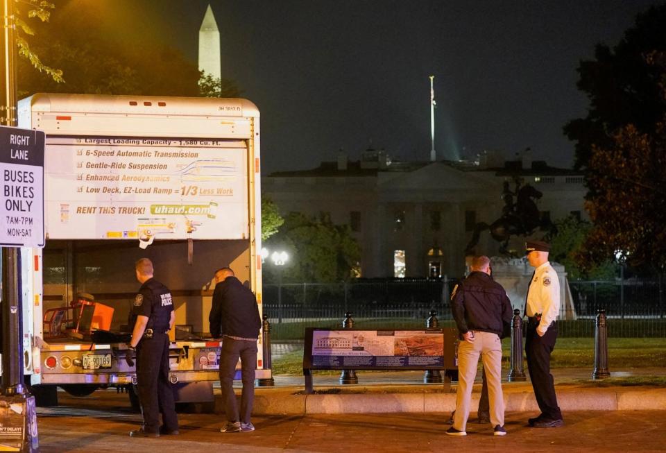 PHOTO: The U.S. Secret Service and other law enforcement agencies investigate a rented box truck that crashed into security barriers at Lafayette Park across from the White House in Washington, May 23, 2023. (Nathan Howard/Reuters)