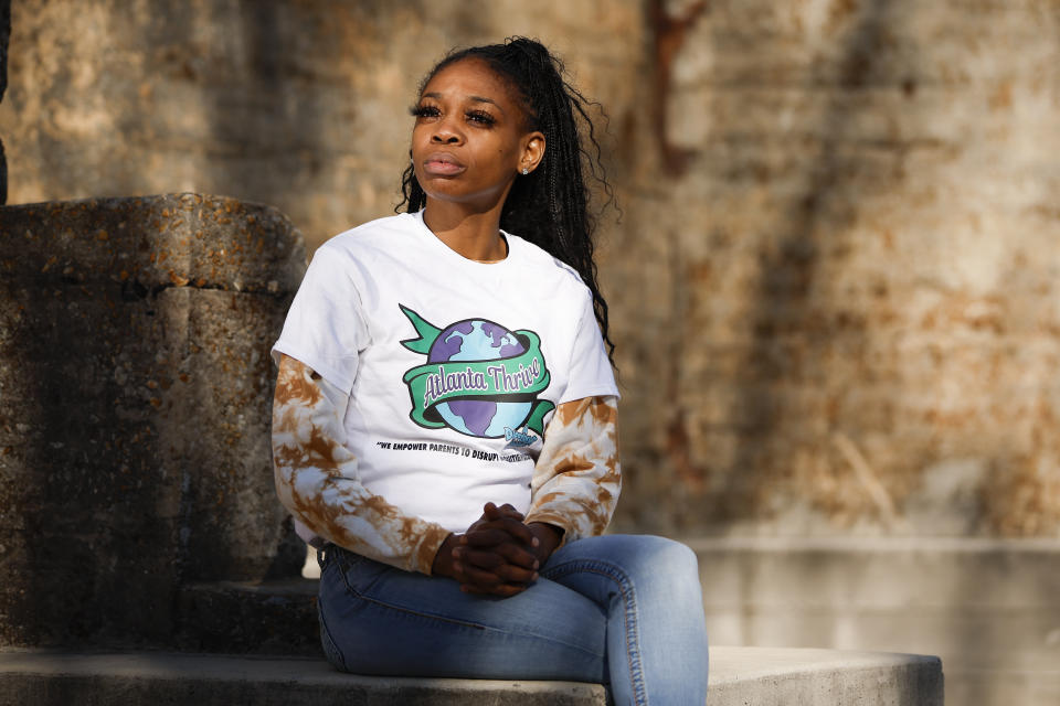 Kimberly Dukes, who co-founded an organization to help families advocate for their children, sits for a portrait on Monday, Dec. 18, 2023, in Atlanta. During the pandemic, she and her children became homeless and moved in with her brother. She struggled to convince her children’s school they really lived with him. Soon, she heard from other caregivers having similar problems. Last year, she estimates she helped 20 to 30 families re-enroll their children in Atlanta Public Schools. (AP Photo/Alex Slitz)