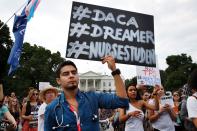 Nursing student Carlos Esteban, a DACA recipient, rallies outside the White House on Sept. 5, 2017.