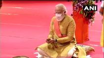 Indian Prime Minister Narendra Modi performs rituals during the groundbreaking ceremony of a temple dedicated to the Hindu god Ram, in Ayodhya, India, Wednesday, Aug. 5, 2020.