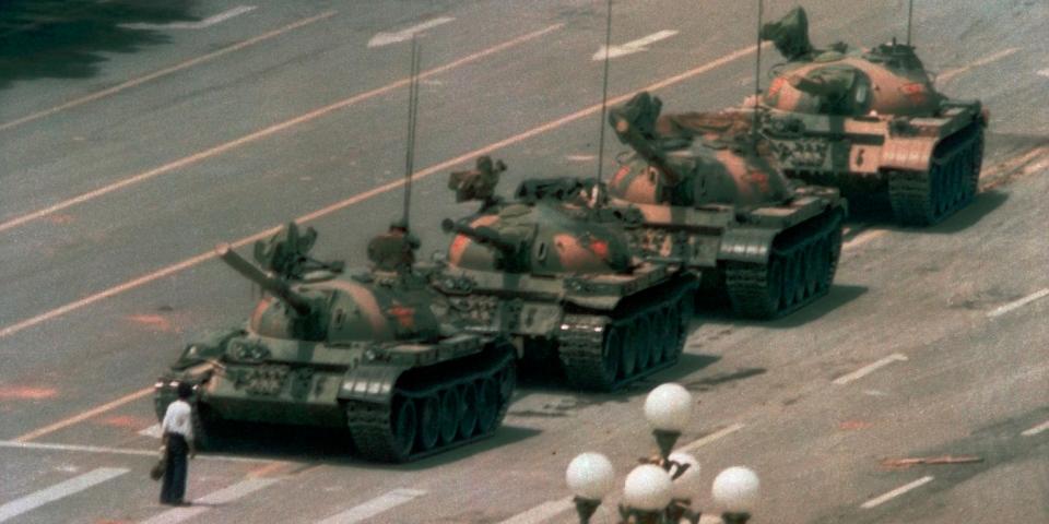 In this June 5, 1989 file photo, a Chinese man stands alone to block a line of tanks heading east on Beijing’s Changan Blvd in Tiananmen Square. The man, calling for an end to the recent violence and bloodshed against pro-democracy demonstrators, was pulled away by bystanders, and the tanks continued on their way. Over 7 weeks in 1989, student-led pro-democracy protests centered on Beijing’s Tiananmen Square became China’s greatest political upheaval since the end of the Cultural Revolution more than a decade earlier. AP Photo/Jeff Widener, File