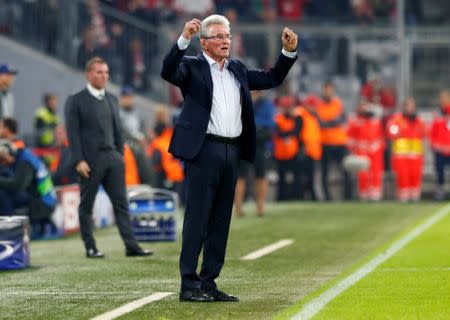 Soccer Football - Champions League - Bayern Munich vs Celtic - Allianz Arena, Munich, Germany - October 18, 2017 Bayern Munich coach Jupp Heynckes celebrates Robert Lewandowski goal, which was ruled out for offside REUTERS/Michaela Rehle