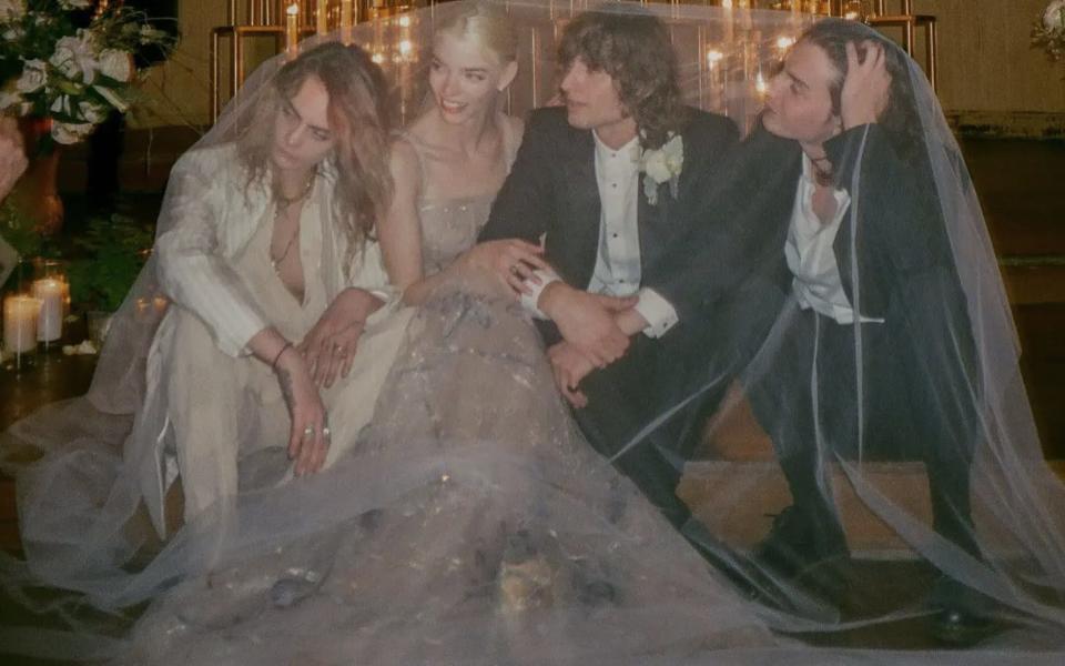 Taylor-Joy wore a Dior wedding dress to the ceremony in Venice, where Cara Delevingne, left, was among the guests