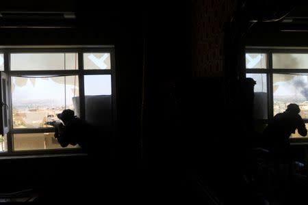 A sniper of Federal police take his position during a battle between Iraqi forces and Islamic State militants in western Mosul, Iraq May 18, 2017. REUTERS/Alaa Al-Marjani