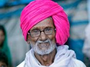 A tribal man takes part in a protest against land acquisition in Mumbai July 25, 2011. Dozens of demonstrators from the village of Beed came to Mumbai to protest against the acquisition of their agricultural land by the government, an organizer said. REUTERS/Danish Siddiqui