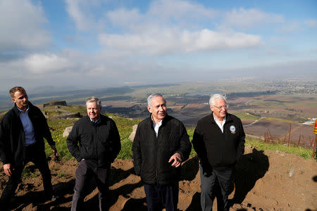 FILE PHOTO: Israeli Prime Minister Benjamin Netanyahu, U.S. Republican Senator Lindsey Graham and U.S. Ambassador to Israel David Friedman visit the border line between Israel and Syria at the Israeli-occupied Golan Heights March 11, 2019 REUTERS/Ronen Zvulun/File Photo