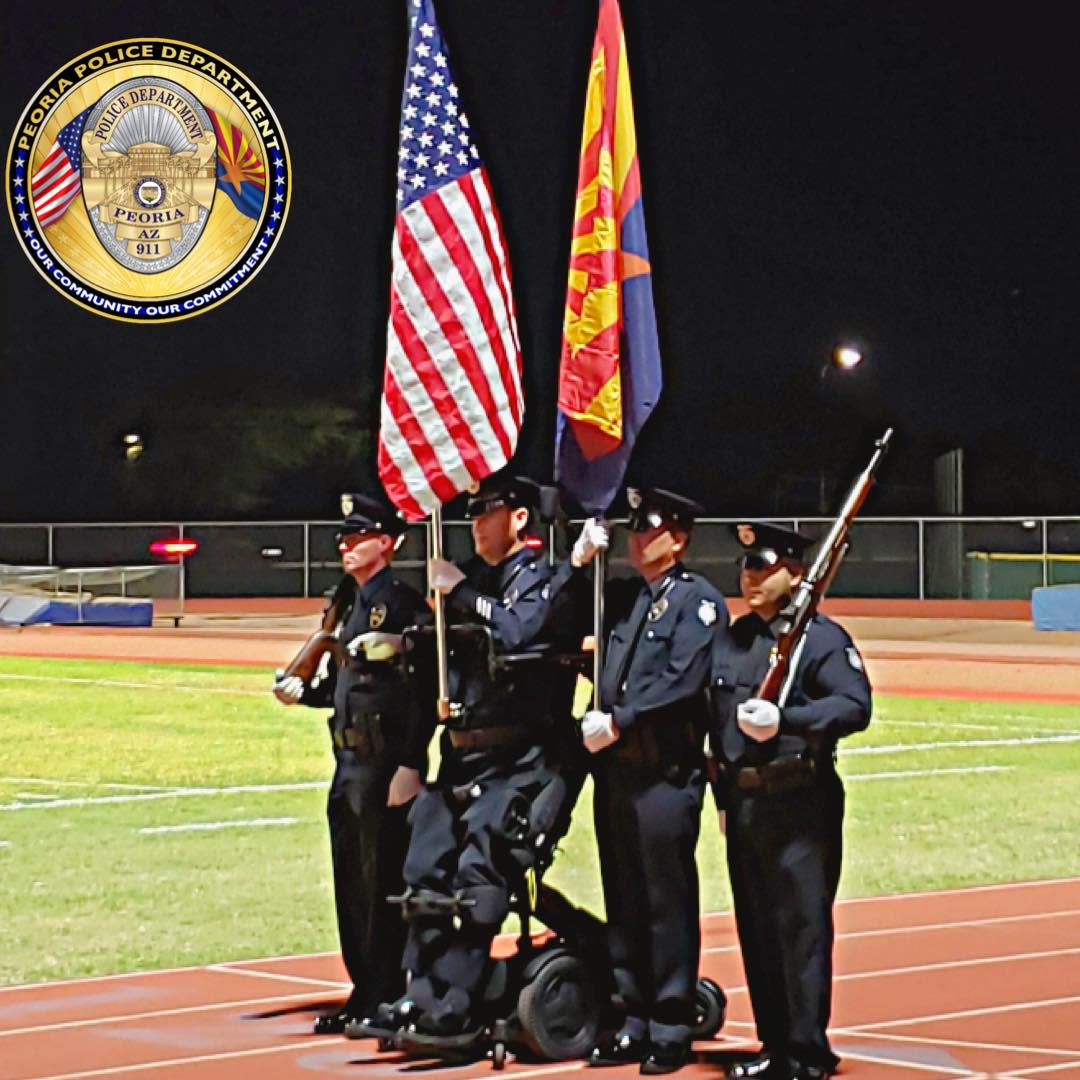 Officer William Weigt of the Peoria Police Department in Arizona stood for the National Anthem for the first time since he was paralyzed in 2005. (Photo: Facebook/Peoria Police Department)