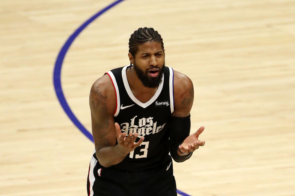 LOS ANGELES, CALIFORNIA - FEBRUARY 21: Paul George #13 of the Los Angeles Clippers reacts to a play during the fourth quarter against the Brooklyn Nets at Staples Center on February 21, 2021 in Los Angeles, California. NOTE TO USER: User expressly acknowledges and agrees that, by downloading and or using this photograph, User is consenting to the terms and conditions of the Getty Images License Agreement. (Photo by Katelyn Mulcahy/Getty Images)