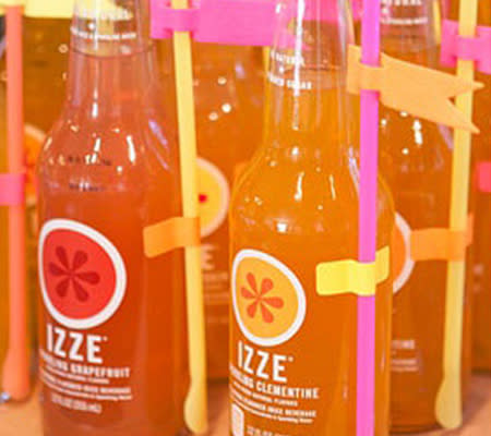 Photo by: Armelle Blog<br><br><b>Colored sodas</b> <br> These fun sodas come in a rainbow of colors and are the perfect color-coordinated beverage option for your party! Add punchy colored straws for a happy surprise for the guests.