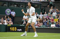 Serbia's Novak Djokovic celebrates during the men's singles match against Britain's Jack Draper on day one of the Wimbledon Tennis Championships in London, Monday June 28, 2021. (AP Photo/Kirsty Wigglesworth)