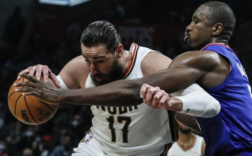 Los Angeles, CA, Monday, November 29, 2021 - Clippers center Serge Ibaka struggles to cover New Orleans Pelicans center Jonas Valanciunas (17) at Staples Center. (Robert Gauthier/Los Angeles Times)