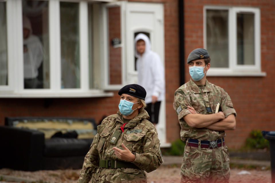 RAF personnel in Selly Oak, close to the University of Birmingham, assisting with Birmingham City Council's 'Drop and Collect' coronavirus test distribution, as the local authority attempt to stem the rise of cases in the area.