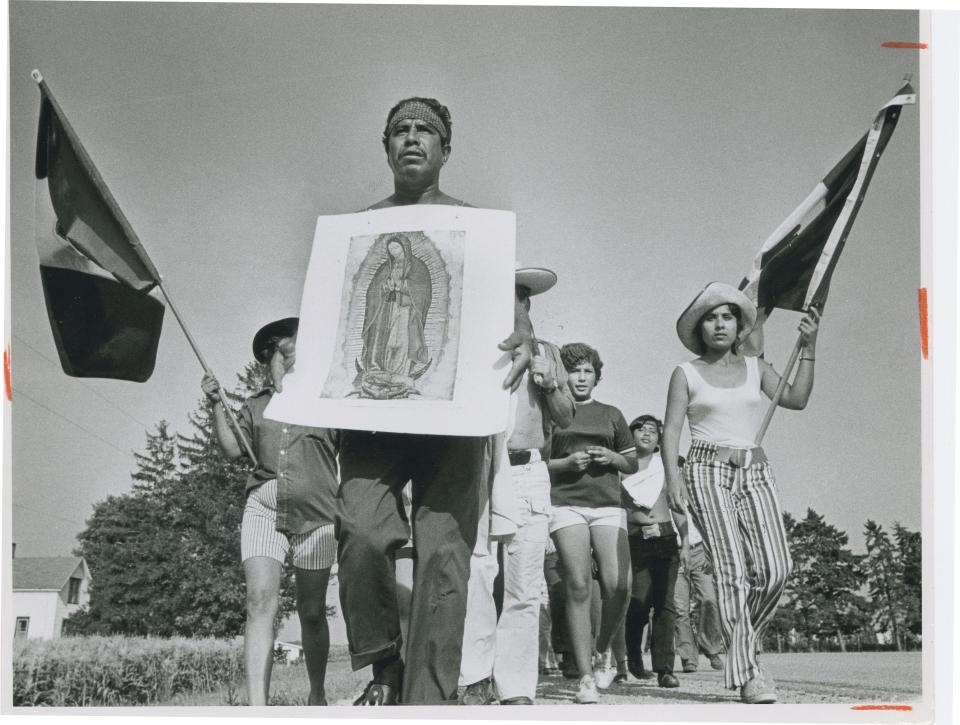 Migrant farm workers and their supporters staged a march to Madison in 1971 to press for better wages and improved housing conditions. Carrying a picture of Our Lady of Guadalupe was Encarnacion Contreras of Milwaukee. At far right was Usemia Seymour of Sheboygan.