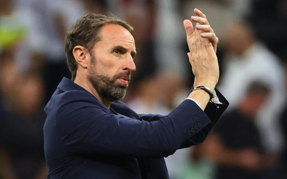 Soccer Football - FIFA World Cup Qatar 2022 - Round of 16 - England v Senegal - Al Bayt Stadium, Al Khor, Qatar - December 4, 2022 England manager Gareth Southgate applauds fans after the match as England progress to the quarter finals