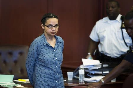 Yoselyn Ortega (L), nanny who is accused of killing Lucia and Leo Krim, ages 6 and 2 respectively, arrives for a hearing for her trial at Manhattan Supreme Court in New York, July 8, 2013. REUTERS/Lucas Jackson