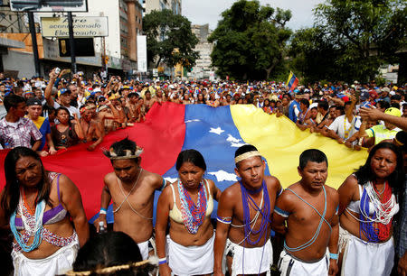 Opposition supporters take part in a rally to demand a referendum to remove Venezuela's President Nicolas Maduro in Caracas, Venezuela, September 1, 2016. REUTERS/Carlos Garcia Rawlins