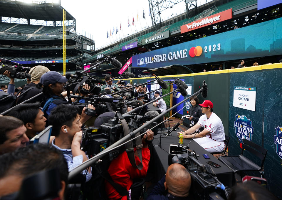 American League's Shohei Ohtani, of the Los Angeles Angels, speaks to media during All-Star Game player availability, Monday, July 10, 2023, in Seattle. The All-Star Game will be played Tuesday, July 11. (AP Photo/Lindsey Wasson)