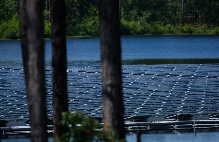 ABERDEEN, NC - JUNE 10: A new floating solar panel system is deployed on Big Muddy Lake at Camp Mackall as the U.S. Army hosts a ribbon-cutting event to unveil the solar energy system on June 10, 2022 at Camp Mackall in Aberdeen, North Carolina. The first of its kind in the Department of Defense and the largest floating system in the southeast United States, the 1.1-megawatt floating solar system will also include a 2-MW/2 megawatt-hour battery energy storage system made by Tesla. (Photo by Melissa Sue Gerrits/Getty Images)