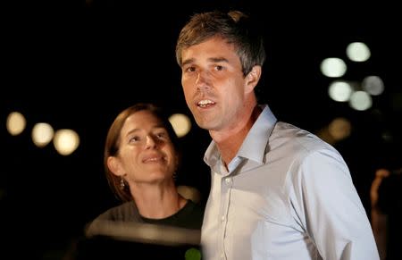 U.S. Rep. Beto O'Rourke (D-TX), candidate for U.S. Senate speaks to reporters with his wife Amy on the last day before the U.S. 2018 midterm elections at the University of Texas El Paso in El Paso, Texas, U.S., November 5, 2018. REUTERS/Mike Segar/Files