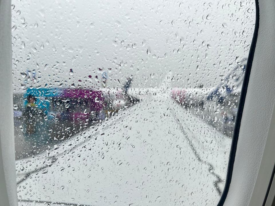 A view outside the MAX 10 window on a rainy day at the airshow.