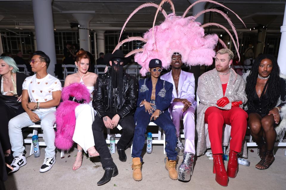 The front row at the Christian Cowan show on Feb. 14 was shining with stars, including, from left, Prabal Gurung, Bella Thorne, Orville Peck, Teyana Taylor, Lil Nas X and Sam Smith.