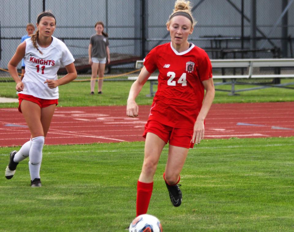 Chatham Glenwood senior forward Ainslie Wilson attacks the net against Troy Triad during the Class 2A supersectional at the Glenwood Athletic Complex on Tuesday, May 31.