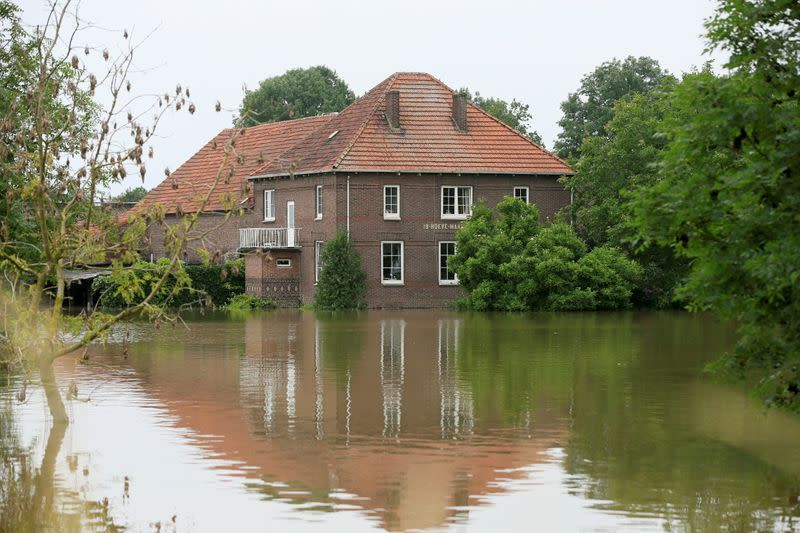 High water is seen near a house, in Roermond