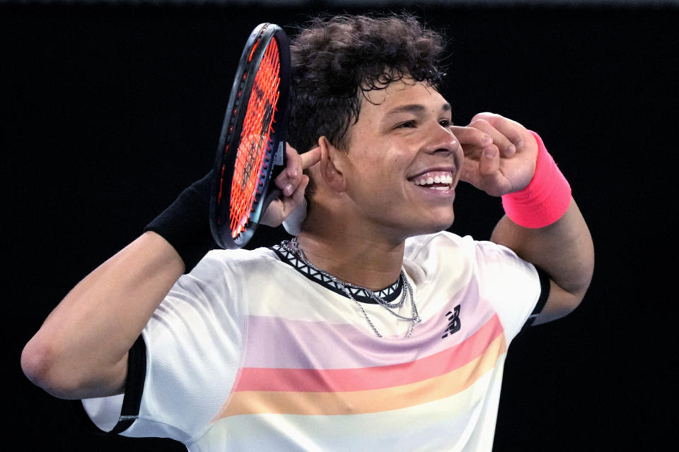 Ben Shelton of the U.S. celebrates after defeating Alexei Popyrin of Australia in their third round match at the Australian Open tennis championship in Melbourne, Australia, Saturday, Jan. 21, 2023. (AP Photo/Dita Alangkara)