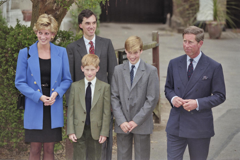 British Royal Diana, Princess of Wales (1961-1997), wearing a blue jacket over a black dress, with Eton housemaster Dr Andrew Gailey, Prince Harry, Prince William, and Prince Charles outside Manor House on Prince William's first day at Eton College in Eton, Berkshire, England, 6th September 1995. (Photo by Princess Diana Archive/Hulton Archive/Getty Images)