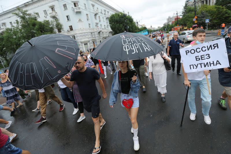 People take part in a rally in support of former regional governor Sergei Furgal in Khabarovsk