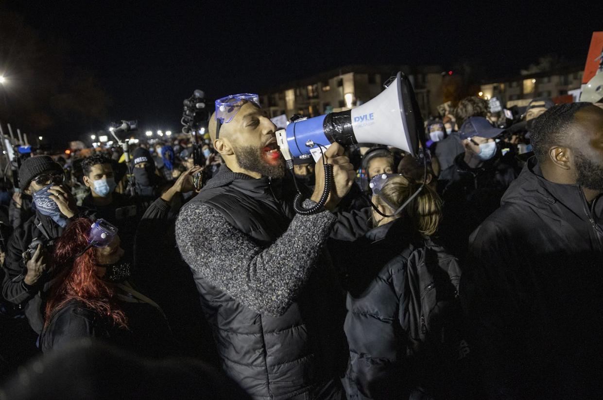 Former NBA player Royce White addresses a crowd after the fatal police shooting of Daunte Wright in April 2021. <a href="https://www.gettyimages.com/detail/news-photo/royce-white-addresses-the-crowd-protestors-continued-to-news-photo/1312995433?adppopup=true" rel="nofollow noopener" target="_blank" data-ylk="slk:Elizabeth Flores/Star Tribune via Getty Images;elm:context_link;itc:0;sec:content-canvas" class="link ">Elizabeth Flores/Star Tribune via Getty Images</a>