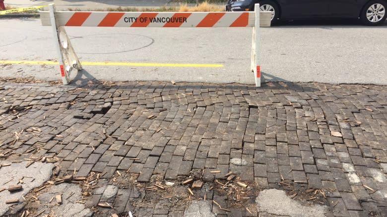 Century-old wood used to pave early Vancouver splintering in heat