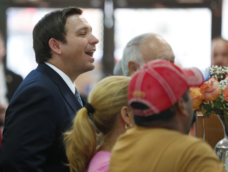 Presumed Governor-elect Ron DeSantis, left, tours Aldo Surgical & Hospital Supply Inc., Thursday, Nov. 8, 2018, in Hialeah Gardens, Fla. (AP Photo/Wilfredo Lee)