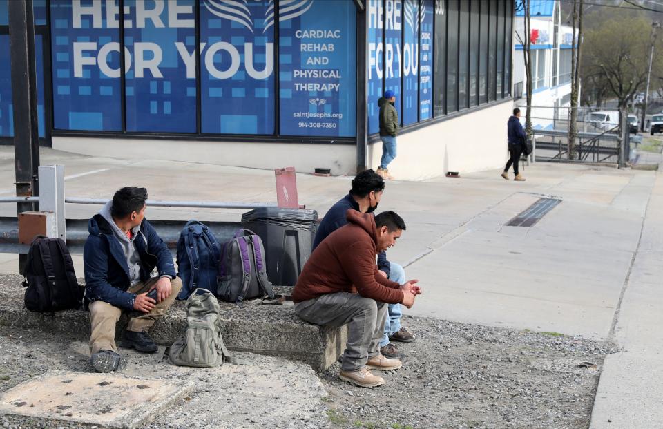 Day laborers seeking work, are pictured along Yonkers Avenue in Yonkers, April 12, 2023. 