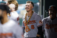 Baltimore Orioles' Ryan Mountcastle smiles in the dugout after his solo home run against the Washington Nationals during the fifth inning of a baseball game at Nationals Park, Tuesday, Sept. 13, 2022, in Washington. (AP Photo/Alex Brandon)