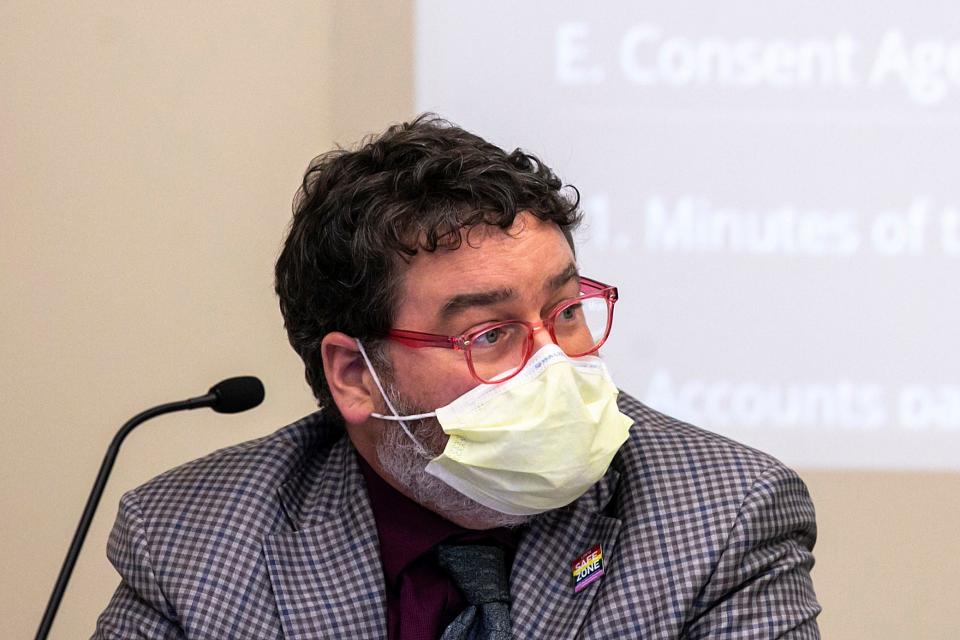 Iowa City Community School District board member J.P. Claussen listens during a meeting, Tuesday, Nov. 23, 2021, at the district's Educational Services Center (ESC) at 1725 North Dodge Street in Iowa City, Iowa.