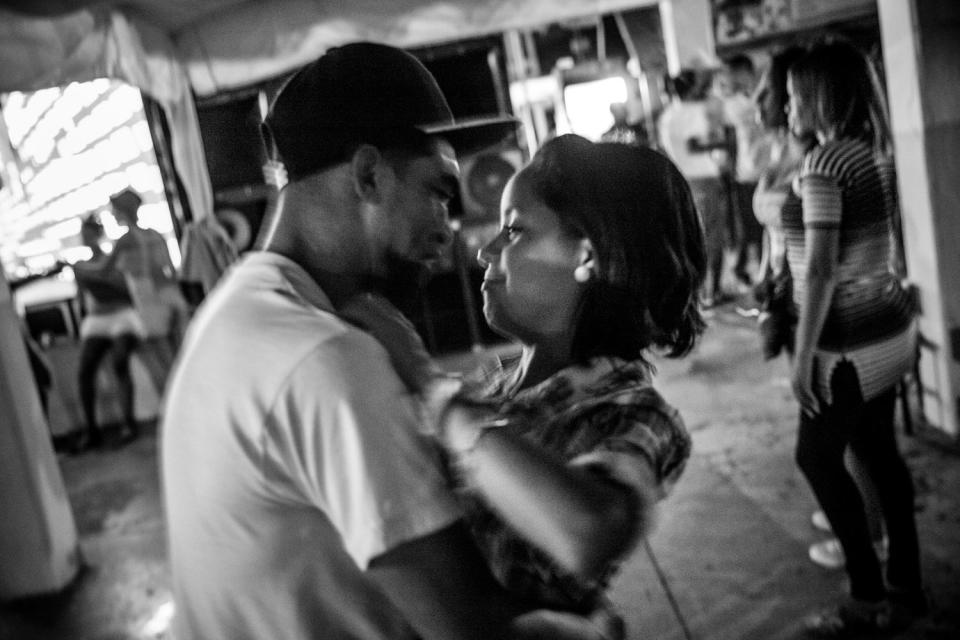 A couple is seen dancing.