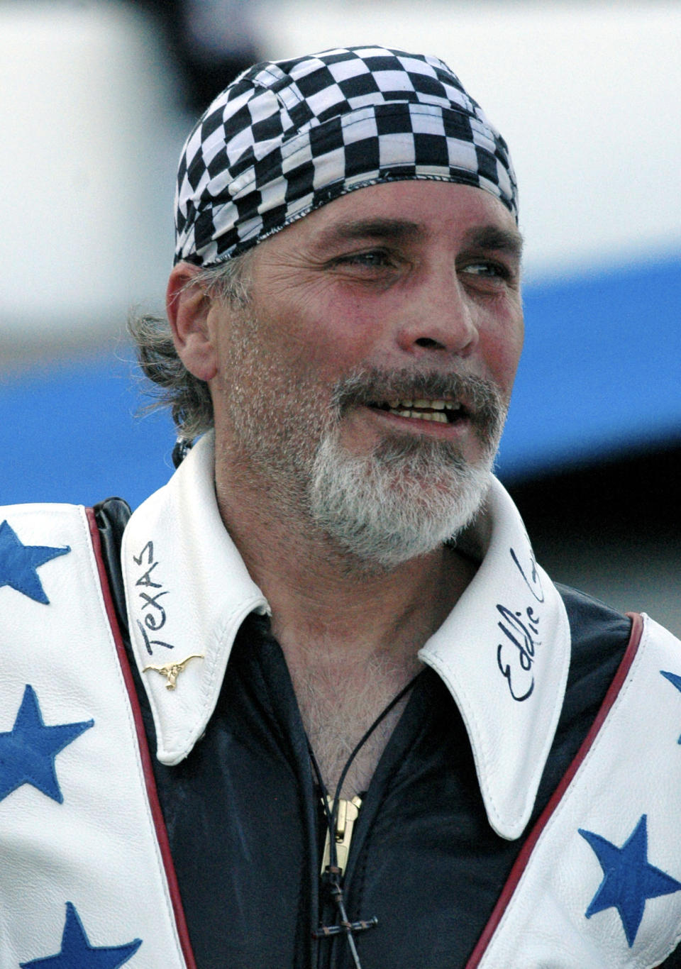 FILE - Robbie Knievel appears after his motorcycle jump before the start of the IRL Firestone 550 auto race at the Texas Motor Speedway in Fort Worth, Texas on June 5, 2010. (AP Photo/Randy Holt, File)