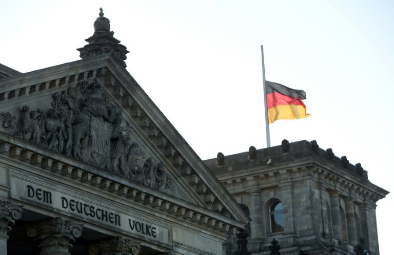 The German flag flutters at half-mast on the Reichstag building in Berlin, where the Bundestag (lower house of parliament) held a solemn ceremony to mark International Holocaust Remembrance Day on January 27, 2017