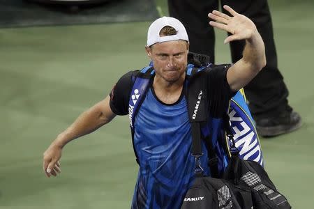 Sep 3, 2015; New York, NY, USA; Lleyton Hewitt of Australia waves to the crowd after his match against Bernard Tomic of Australia (not pictured) on day four of the 2015 U.S. Open tennis tournament at USTA Billie Jean King National Tennis Center. Tomic won 6-3, 6-2, 3-6, 5-7, 7-5. Mandatory Credit: Geoff Burke-USA TODAY Sports