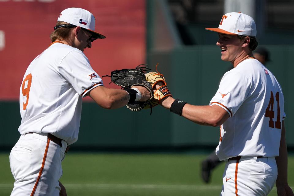Texas Longhorns infielder Jared Thomas (9) and pitcher Cody Howard (41) celebrate an out during the game against Cal Poly at UFCU Disch–Falk Field on Sunday, Feb. 24, 2024 in Austin.