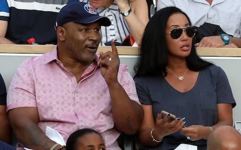 Mike Tyson watches Serena Williams' match - Credit: getty images