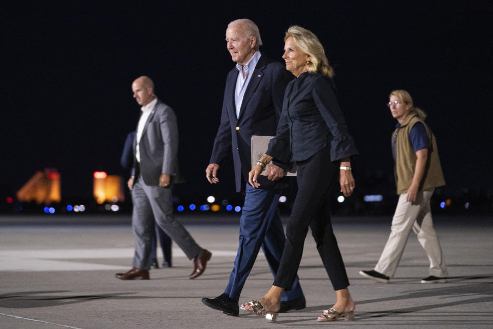 President Joe Biden and first lady Jill Biden arrive at Reno-Tahoe International Airport on Friday, Aug. 18, 2023, in Reno, Nev., for a vacation in the area. (AP Photo/Evan Vucci)