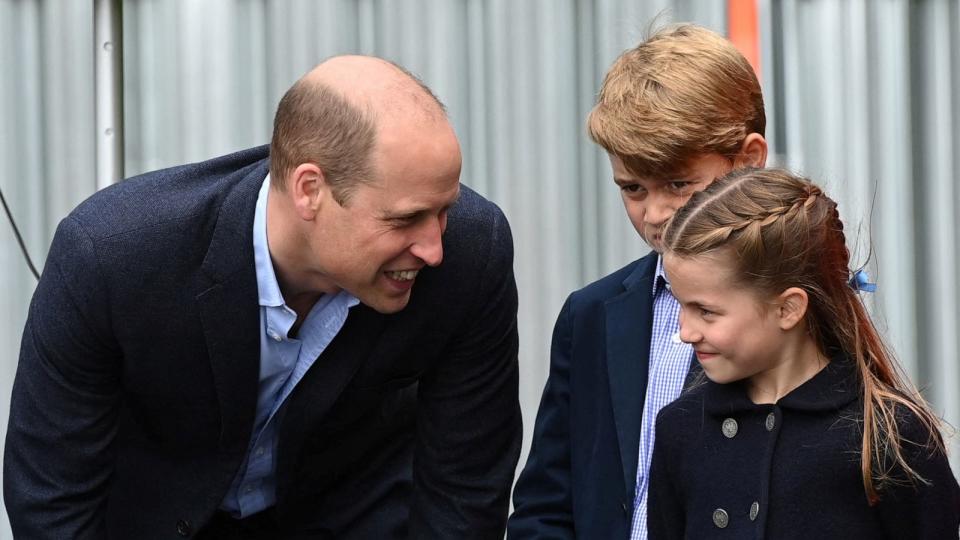 PHOTO: Prince William speaks to his children Prince George and Princess Charlotte during their visit to Cardiff Castle as part of the royal family's tour for Queen Elizabeth's Platinum Jubilee celebrations in Cardiff, Wales, June 4, 2022.  (Ashley Crowden/Pool via Reuters)