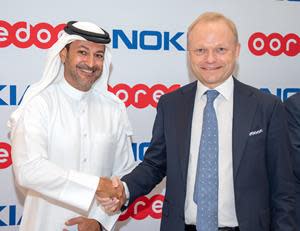 Photo 1: Left to right -- Aziz Aluthman Fakhroo, Managing Director, Ooredoo Group; and Pekka Lundmark, President and Chief Executive Officer at Nokia