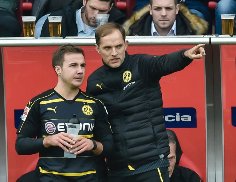 Dortmund's head coach Thomas Tuchel gives midfielder Mario Goetze instructions on October 22, 2016