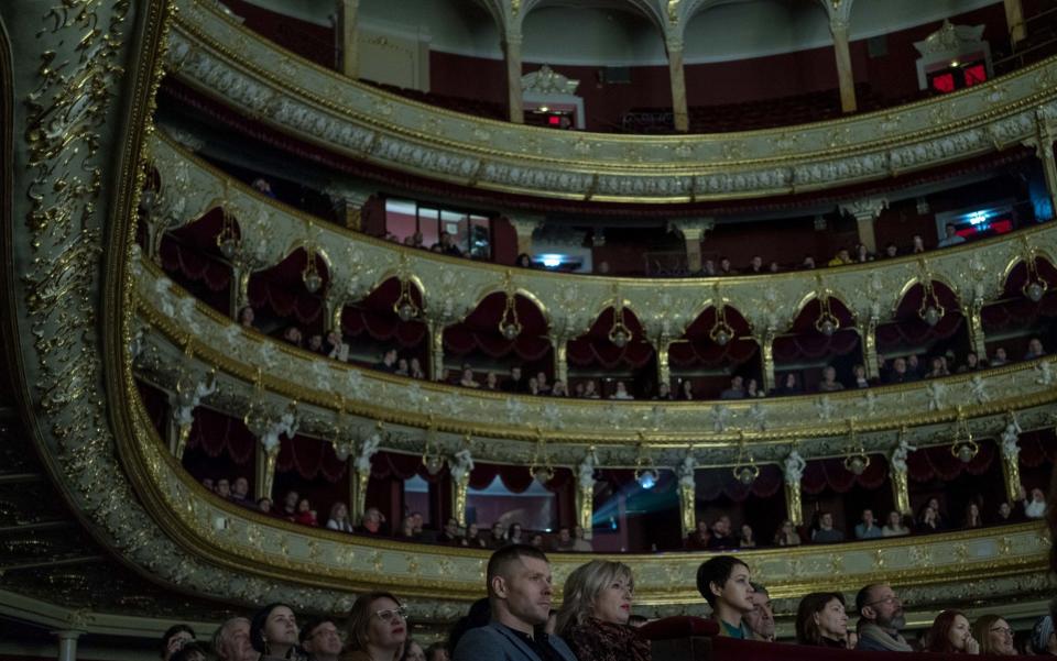 A general view from the Oleksandr Rodin's opera "Kateryna" based on the poem by T. G. Shevchenko as people watch during the world premiere, at the Odessa City Opera in Ukraine - Anadolu Agency/Anadolu