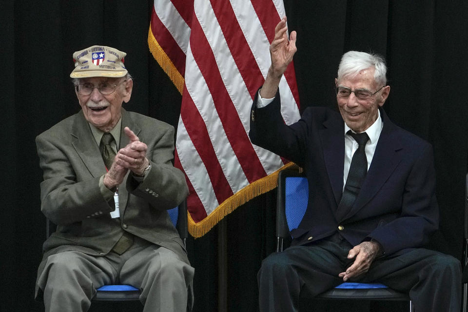 Harry Moyer, right, and Mel McMullen during a ceremony in honor of Flying Tigers  (Andy Wong / AP)