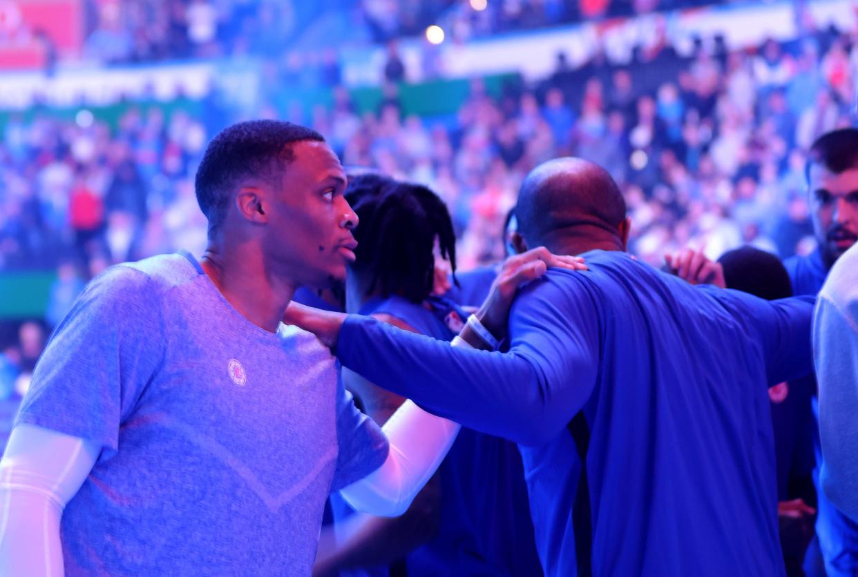 LA Clippers' Russell Westbrook (0) stands in the huddle before the NBA basketball game between the Oklahoma City Thunder and the Los Angelos Clippers at Paycom Center in Oklahoma City, Thursday, Dec. 21, 2023.