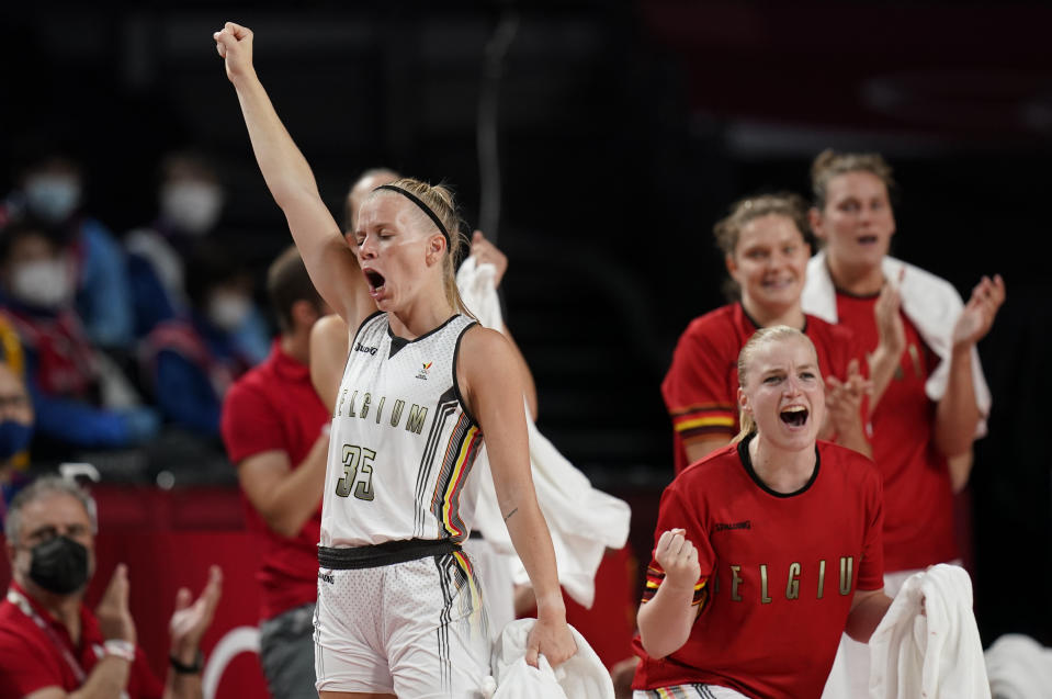 Belgium players on bench celebrate scoring by a teammate during women's basketball preliminary round game against Puerto Rico at the 2020 Summer Olympics, Friday, July 30, 2021, in Saitama, Japan. (AP Photo/Eric Gay)